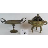 A bronze Chinese temple censer with cherry blossom motifs and tree form lid.