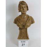 A period Art Nouveau terracotta bust of a peasant girl, signed F. Fouché. Height: 40cm.