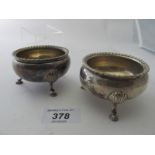 A pair of silver circular salts on pad feet, London 1915, Garrard & Co Ltd,