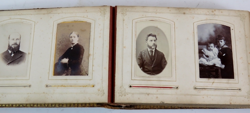 A Victorian leather bound photo album containing various family photos and a framed set of four - Image 5 of 5