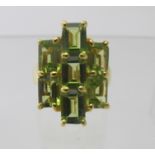 Peridot multi octagonal cut ring, large 22mm x 16mm setting, size N, 7cts.