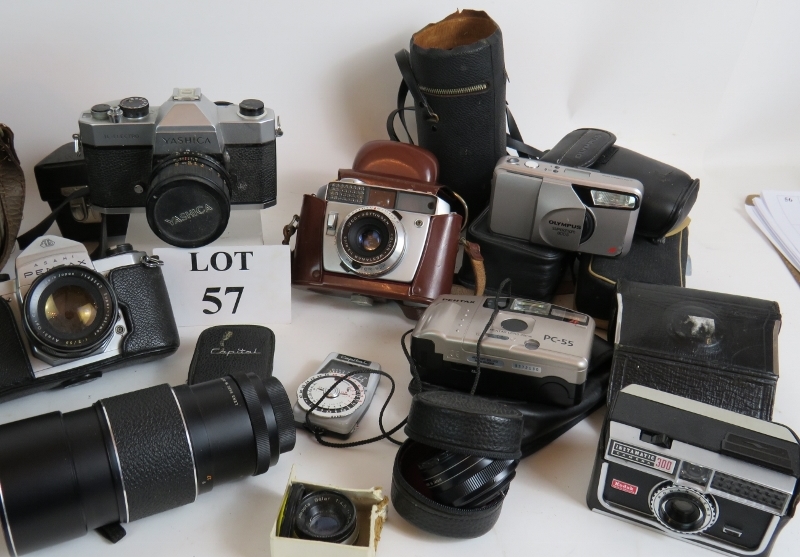 A collection of vintage 35mm cameras and lenses including Yashica, Pentax, Olympus and Vivitar, - Image 3 of 3