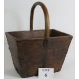 A large country trug or basket constructed from elm with a bentwood handle and steel corner braces.