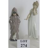 Two contemporary NAO by Lladro figures, one of a boy and puppy, the other a yawning girl.
