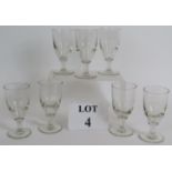 Seven Early 19th Century short stem wine glasses each with a bladed knop. Height: 11.5cm.