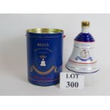 A sealed commemorative Wade decanter of Bells Whisky commemorating the birth of Princess Beatrice,