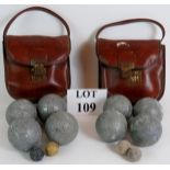 Two vintage sets of Petanque Boules in original carrying cases. Cast metal Boules with wooden jacks.