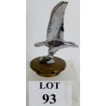 A chrome Alvis Owner's Club car mascot in the form of a flying eagle with upright wings,