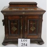 A superb quality 19th Century Rosewood jewellery chest with inlaid mother of pearl decoration.