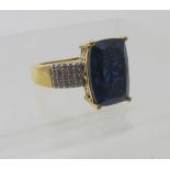 Brazilian quartz gemstone ring, midnight blue, elongated cushion cut solitaire, size M.