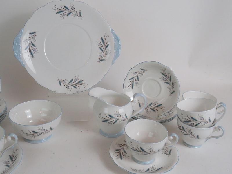 A Mid Century six setting Royal Doulton tea service with blue foliate decoration. - Image 3 of 4