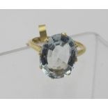 An 18ct yellow gold ring set with an oval aquamarine, approx 4.2cts, size N.