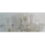 A large collection of vintage and antique glassware including vases, jugs, salts and candlesticks.