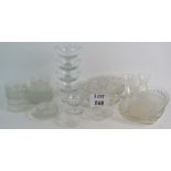 A selection of mainly pressed glass serving dishes and dessert bowls, including two sets.