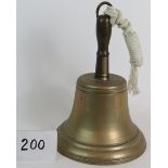 A large vintage ship's or school bell, height: 35cm. Maximum diameter: 23cm.