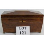 A good quality 19th Century sarcophagus shaped tea caddy in mahogany veneer with inlaid stringing.