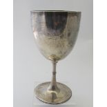 A plain Victorian silver goblet with white bead edge base, Birmingham 1863, approx 6" high,