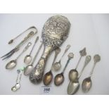 A pair of silver sugar tongs, two fully hallmarked silver spoons,