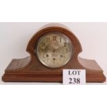 An Edwardian mahogany cased Napoleon mantel clock with inlaid stringing.