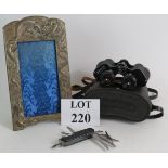 A Japanese cast metal dragon photo frame, 28cm x 16cm,