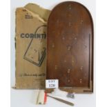 A 1930's Corinthian Bagatelle game with original box, balls, cue and rules. Size: 77cm x 39cm.