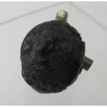 An antique continental carved wooden miniature flask, depicting Roman busts, with metal mounts.