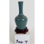 A 19th Century Chinese tea dust stemmed vase with teal coloured glaze.