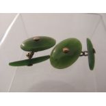 A pair of vintage plain oval jade cuff links. Condition Report: Good condition.