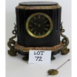 A Nineteenth Century Rollin Paris black slate and marble striking mantel clock with ornate dolphin