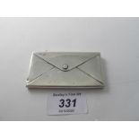 A silver envelope shaped card case with monogram on reverse gilded interior, Birmingham 1907.