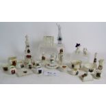 A collection of 26 early 20th century crested china souvenirs including WWI related,