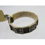 A 9ct gold Georgian mourning ring with black enamelling and yellow metal letters reading 'REGARD',