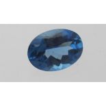 Large 18mm x 13mm blue topaz gemstone, SI clarity, moderately strong colour saturation,