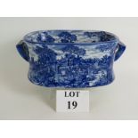 A Victoria Ware Ironstone blue and white transfer printed foot bath with pastoral scenes.