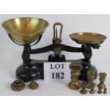 A set of vintage Librasco kitchen scales with brass weights.