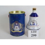 A sealed commemorative Wade decanter of Bells Whisky commemorating the birth of Princess Eugenie,
