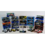 A collection of 31 Scalextric racing cars including Le Mans,