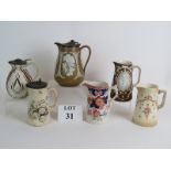 Six antique ceramic jugs including Crown Devon, Cashmere brown field and silicon ware. All as found.