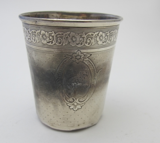 A French silver beaker with embossed flower decoration, approx weight 52 grams/1.6 troy oz.