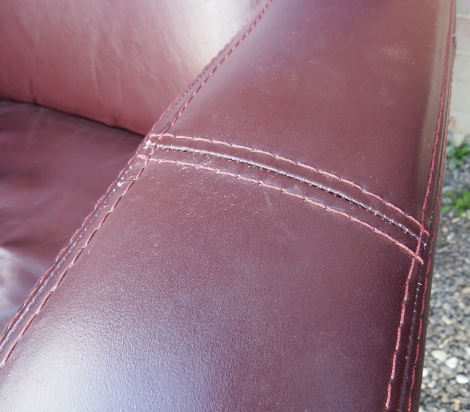 A pair of contemporary tub chairs upholstered in a deep brown / aubergine leather. - Image 3 of 8