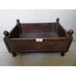 A small decorative antique carved wooden planter. Condition report: Overall good condition. 23.