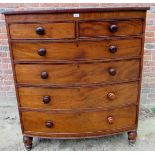 A large 19th Century bow front mahogany chest of two short over four long graduated drawers with