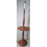 A 19th Century carved mahogany standard lamp table with a reeded column.