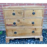 A small 19th Century pine chest of two short over two long drawers.