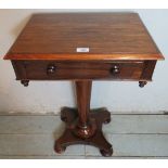 A pretty 19th Century Rosewood side table with a frieze drawer, over a column and platform base.