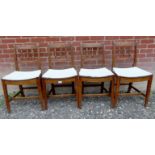 A set of four 19th century oak dining chairs. Condition report: Height has been raised.