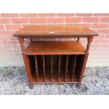 A small 20th Century mahogany music cabinet with a shelf over rack compartments to base.