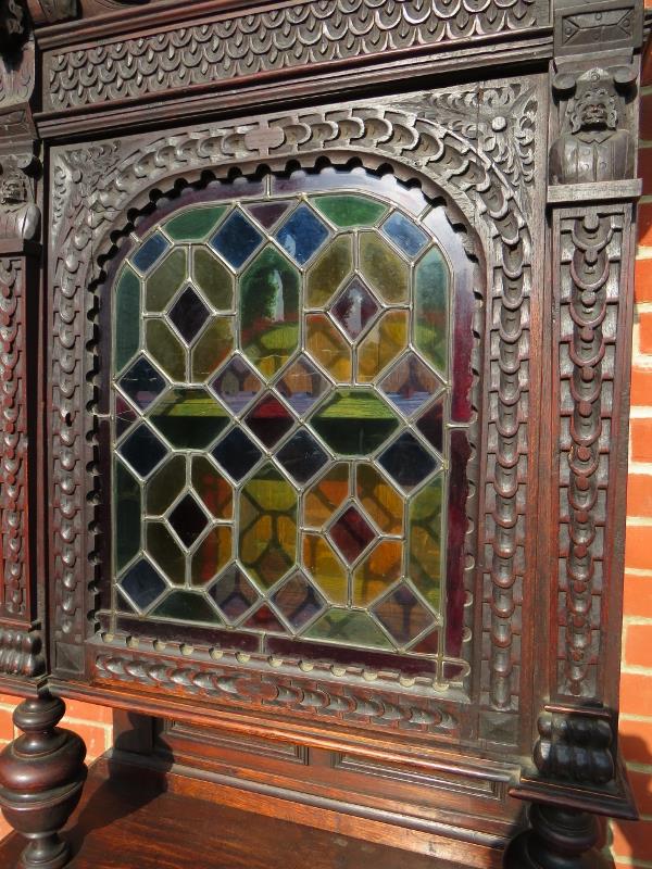 A tall 19th Century carved oak Flemish cabinet with an arched leaded stained glass cupboard to top - Image 3 of 4