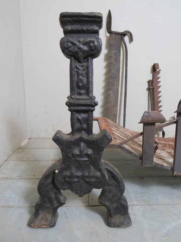 A cast iron fire basket raised on a pair of fire dogs together with three iron pot hooks / fire - Image 2 of 4