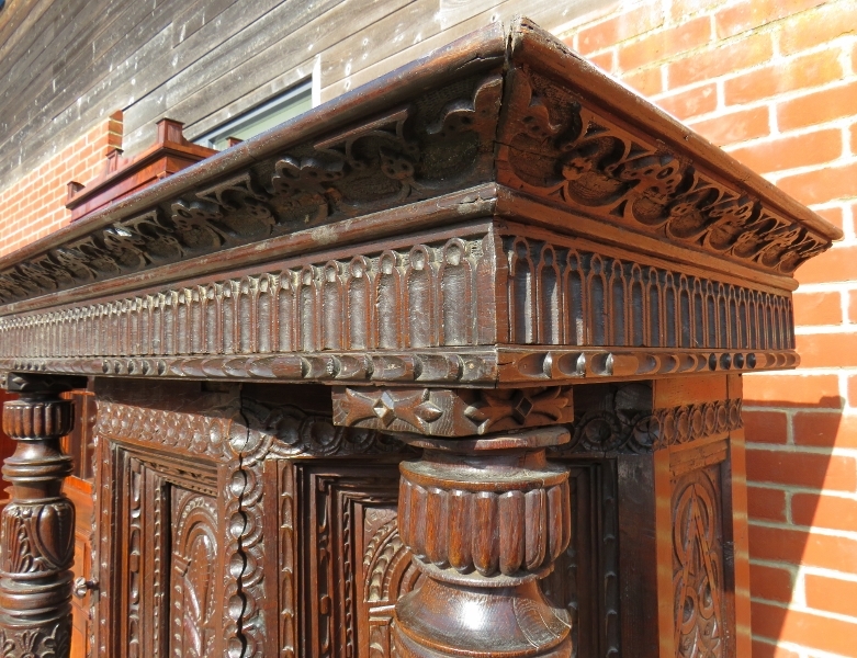 A large part 16th Century carved oak court cupboard with a central cupboard door flanked either - Image 9 of 11